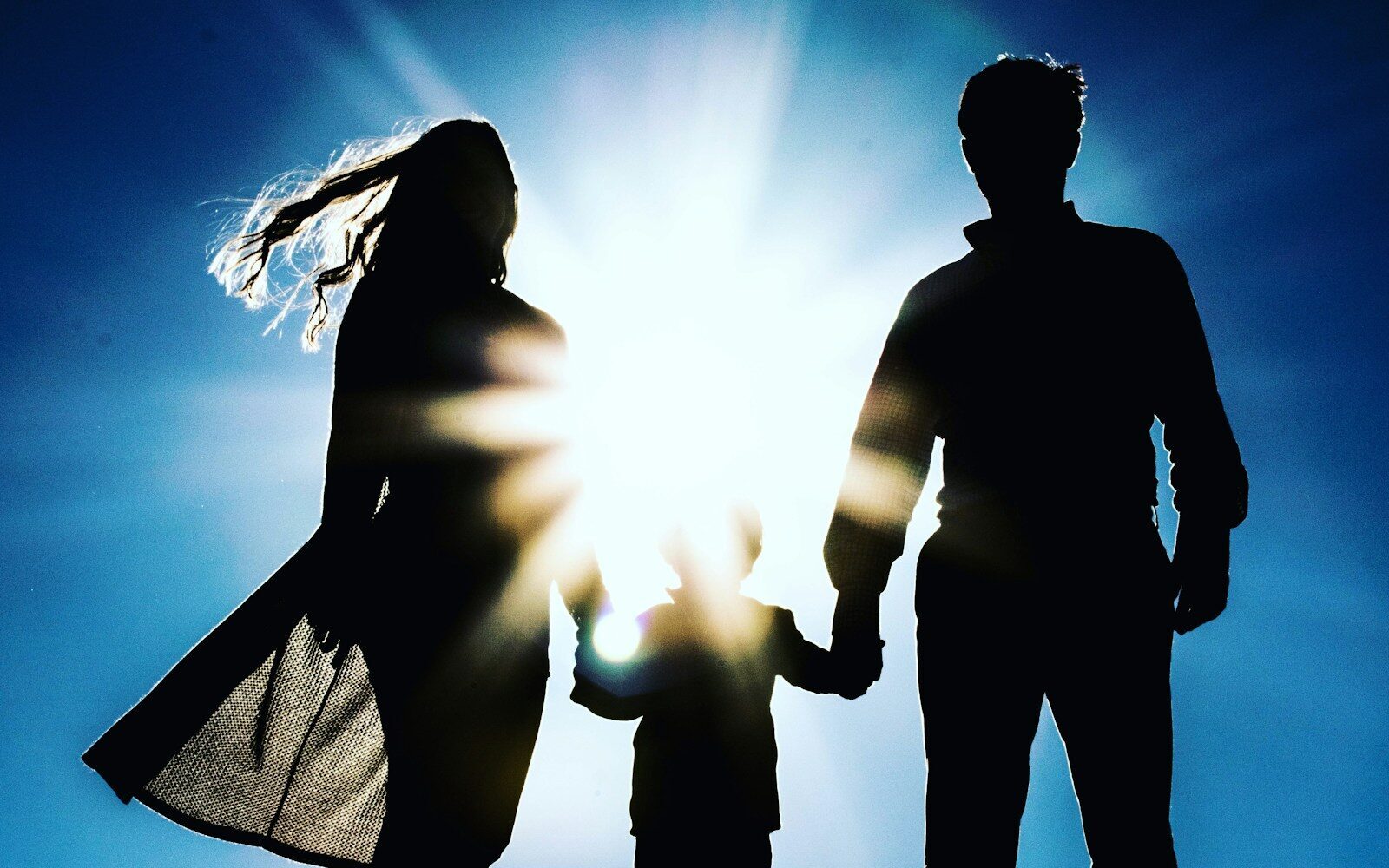 man and woman holding hands